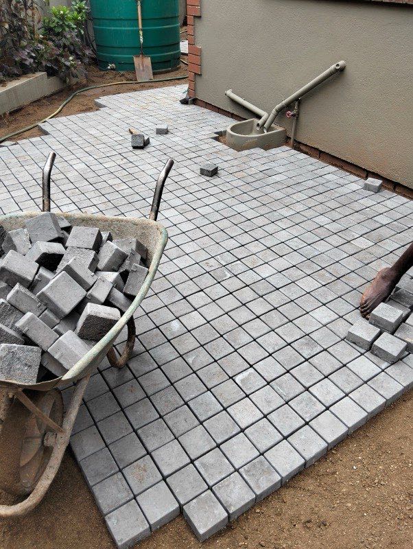 Cobblestone paving being laid